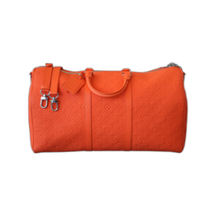 Louis Vuitton Orange Taurillon Monogram Keepall 50