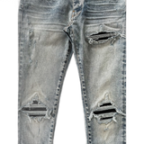 Amiri Stone Indigo & Black Patch MX1 Jeans