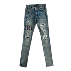 Amiri Clay Indigo Serif Logo Distressed Jeans