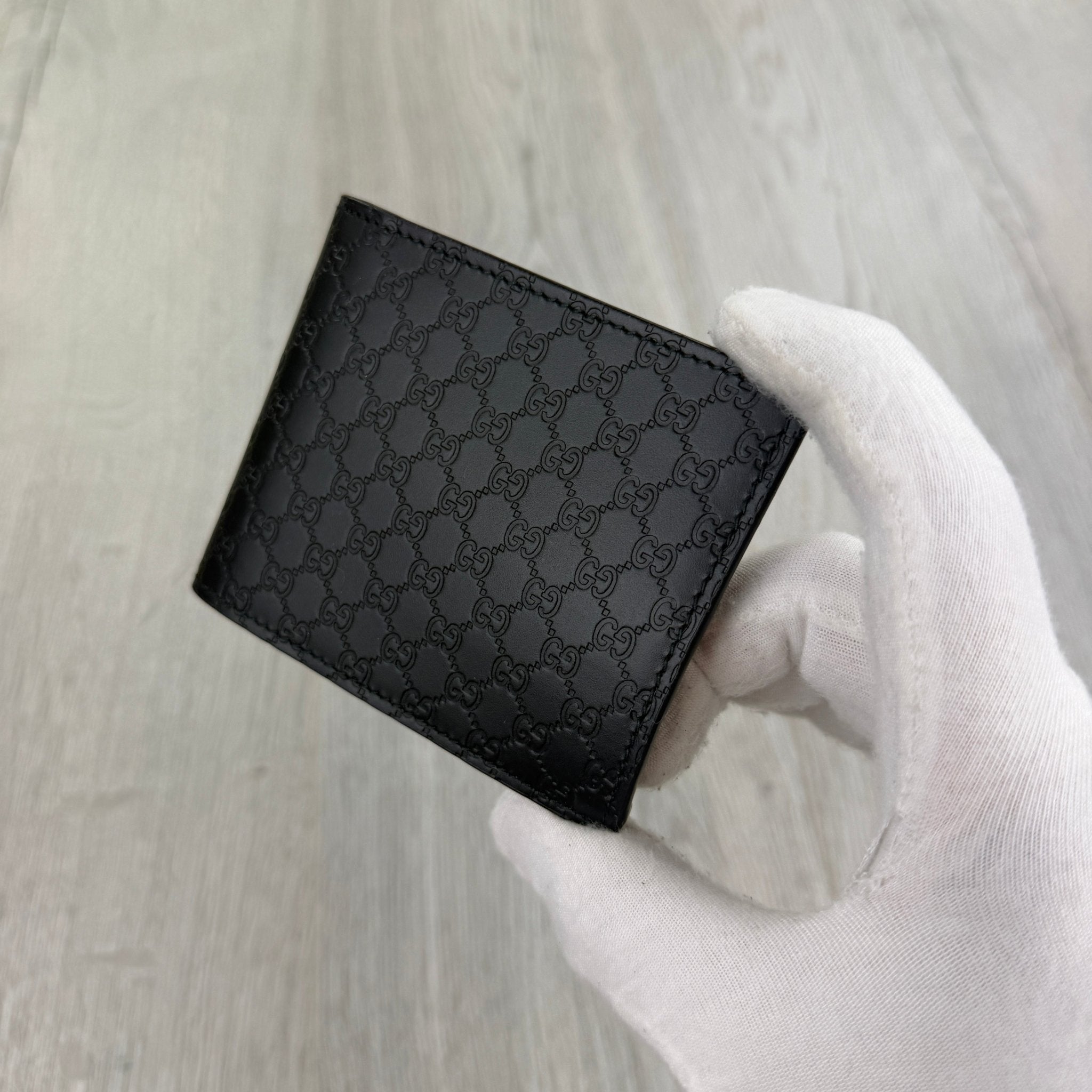 Gucci Men’s GG Leather Monogram Wallet - Morely TrendsGucci Type here:)