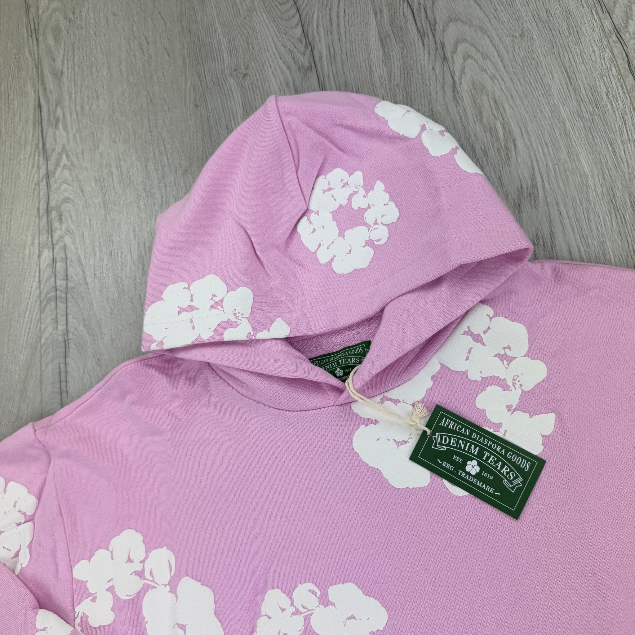 Denim Tears Baby Pink Pullover Hoodie - Morely TrendsDenim Tears Type here:)