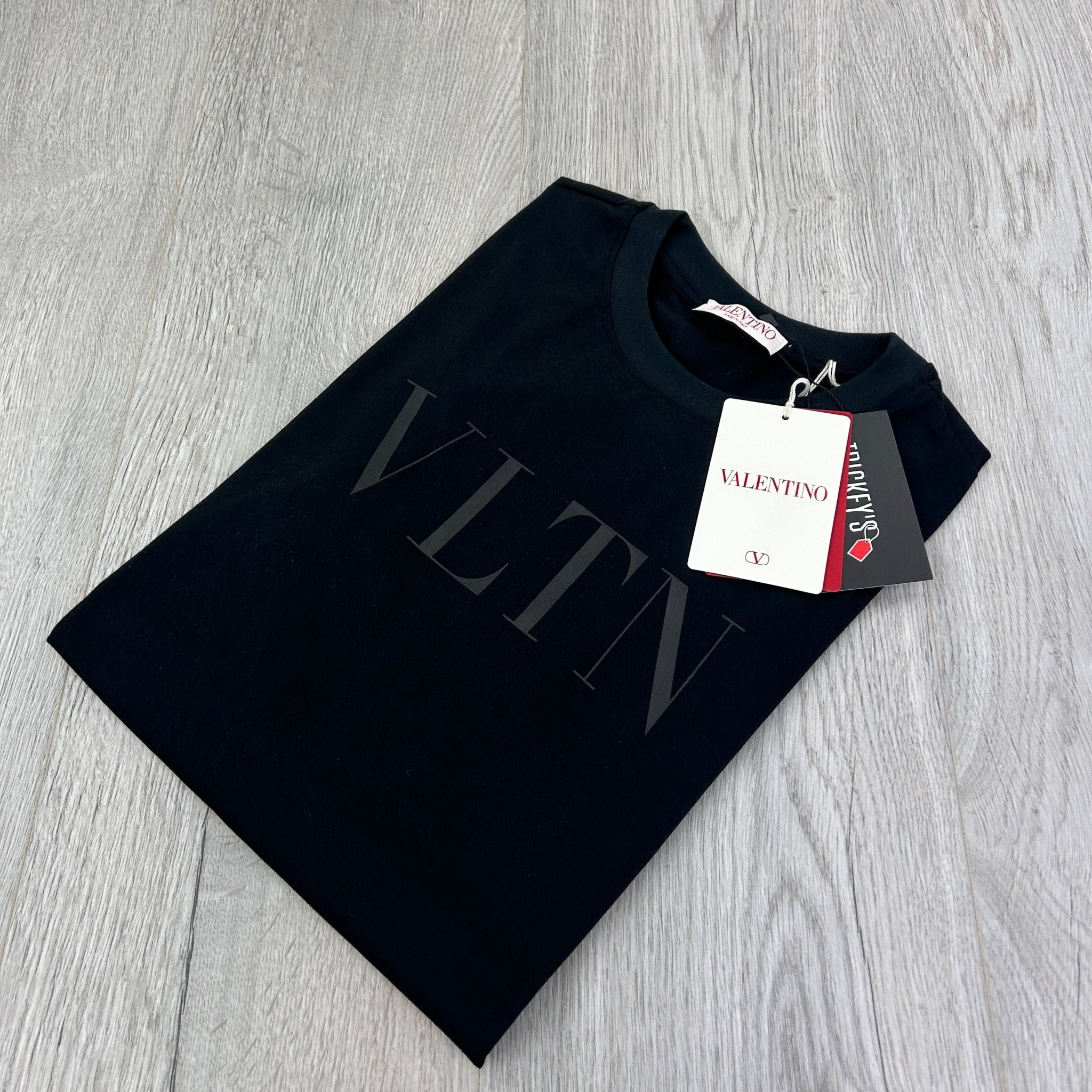 Valentino Men’s ‘VLTN’ Black T-shirt - Morely TrendsValentino Type here:)