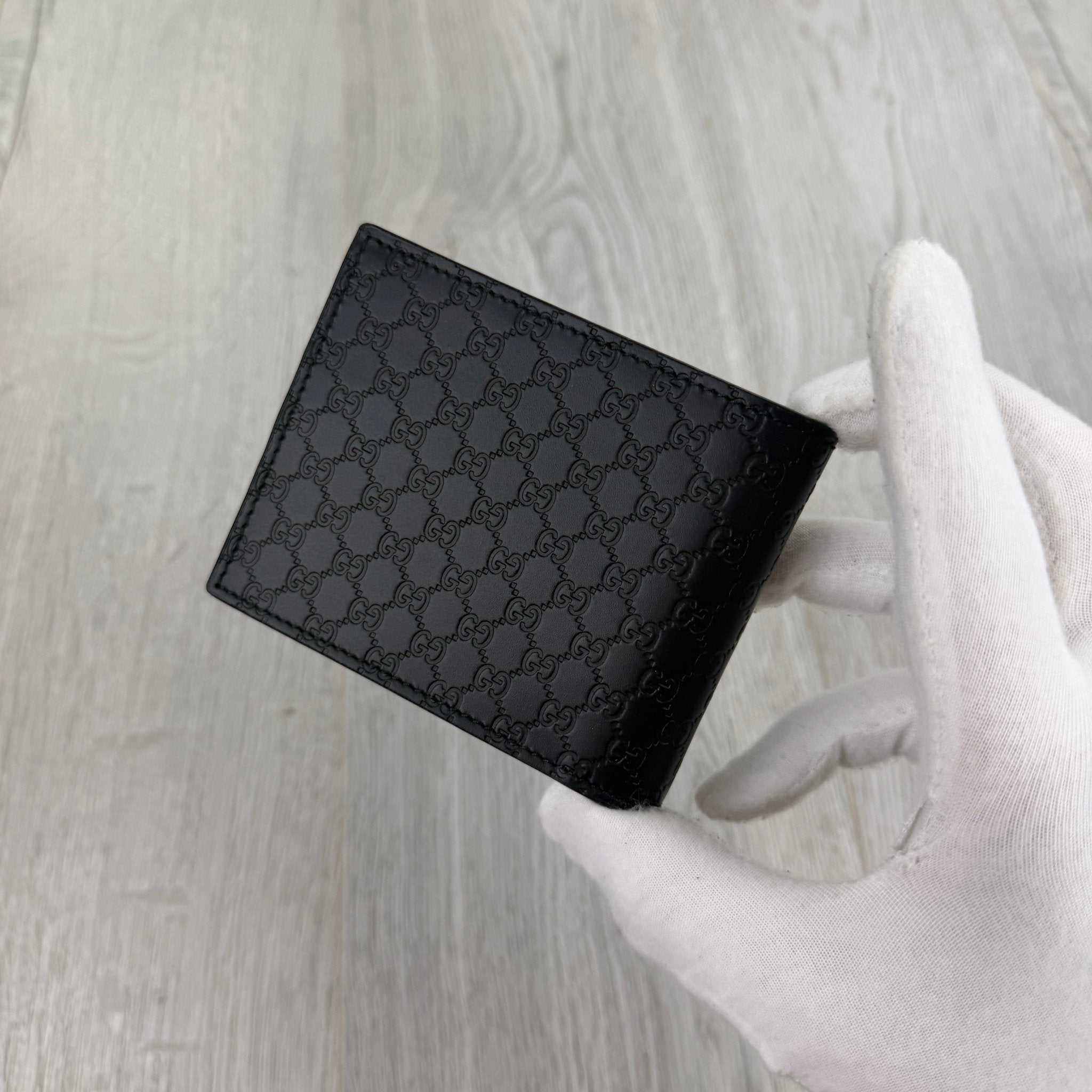 Gucci Men’s GG Leather Monogram Wallet - Morely TrendsGucci Type here:)