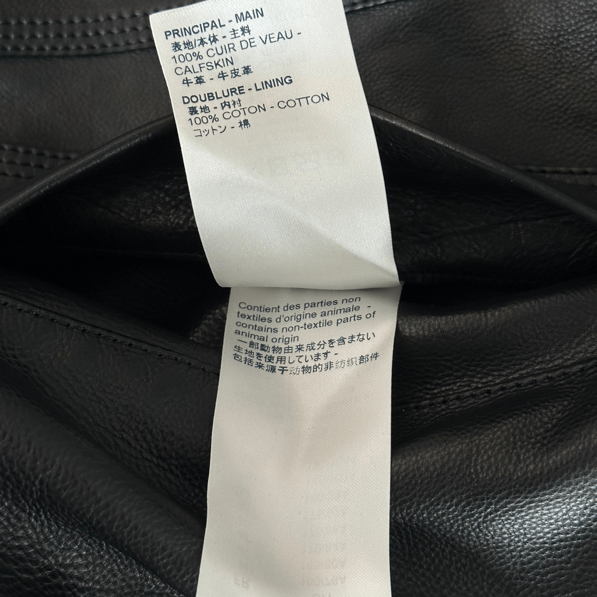 Louis Vuitton Black & White Chain Leather Trucker Jacket - Morely TrendsLouis Vuitton Type here:)