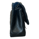 Chanel Black Lambskin Quilted Jumbo Flap Bag - Morely TrendsChanel Type here:)