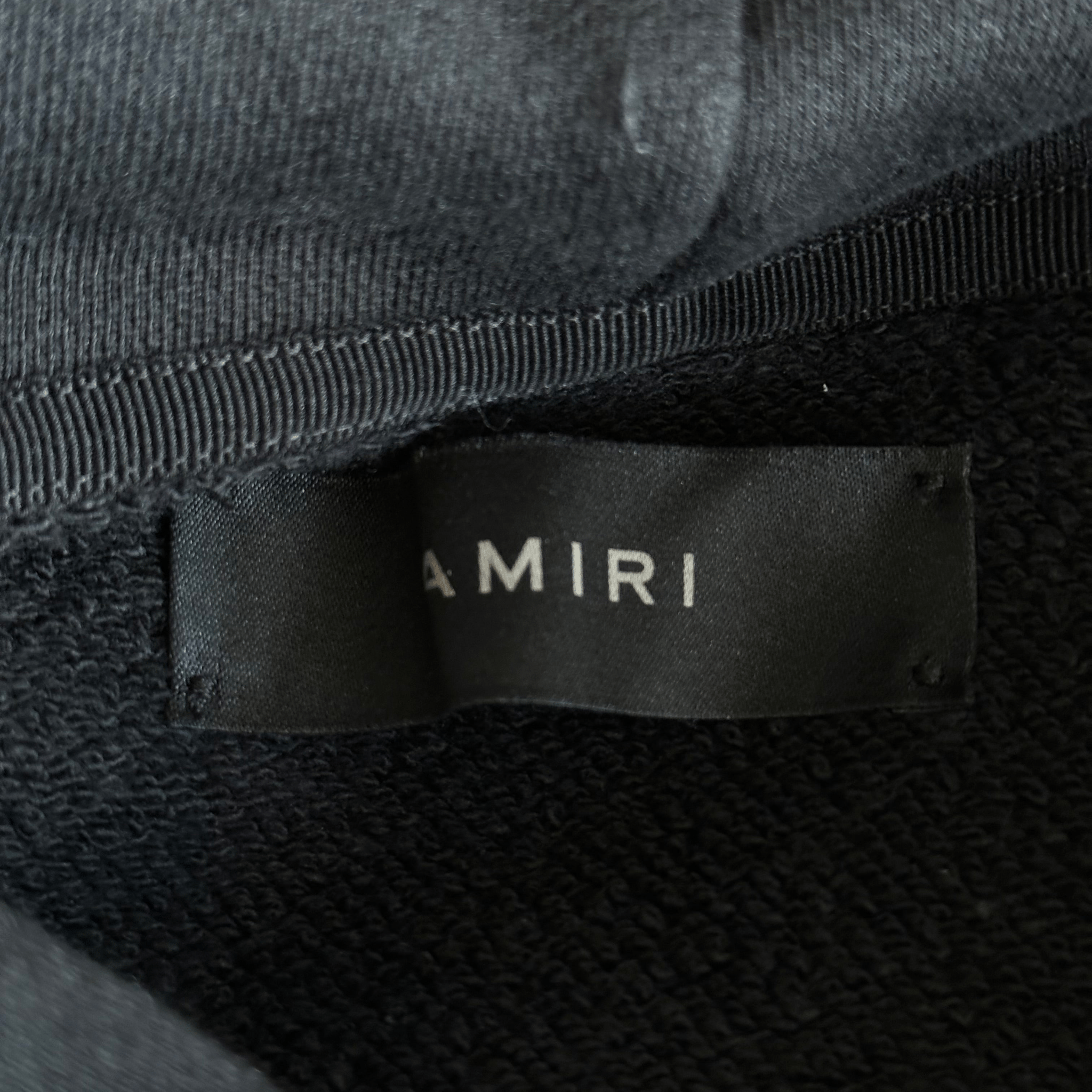 Amiri Black & White Cherub Logo Hoodie - Morely TrendsAmiri Type here:)