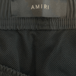 Amiri Black & White Stack Logo Swimshorts - Morely TrendsAmiri Type here:)