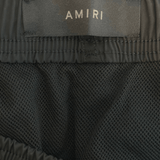 Amiri Black & White Stack Logo Swimshorts - Morely TrendsAmiri Type here:)