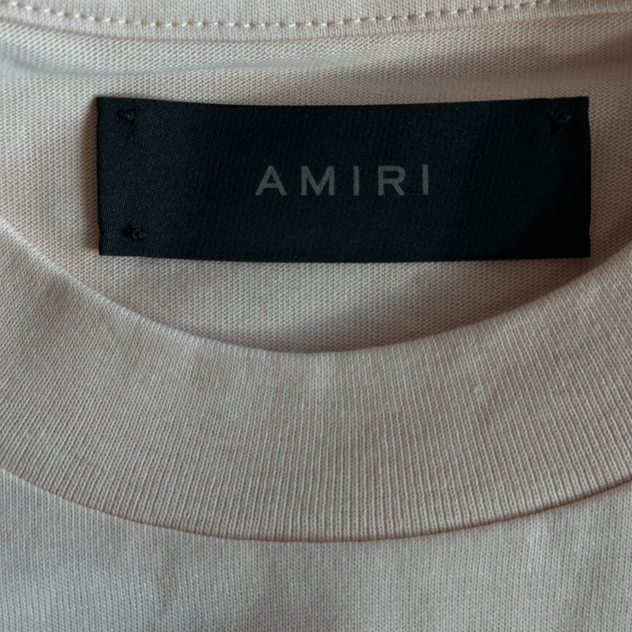 Amiri Cream & Black Core Logo T-Shirt - Morely TrendsAmiri Type here:)
