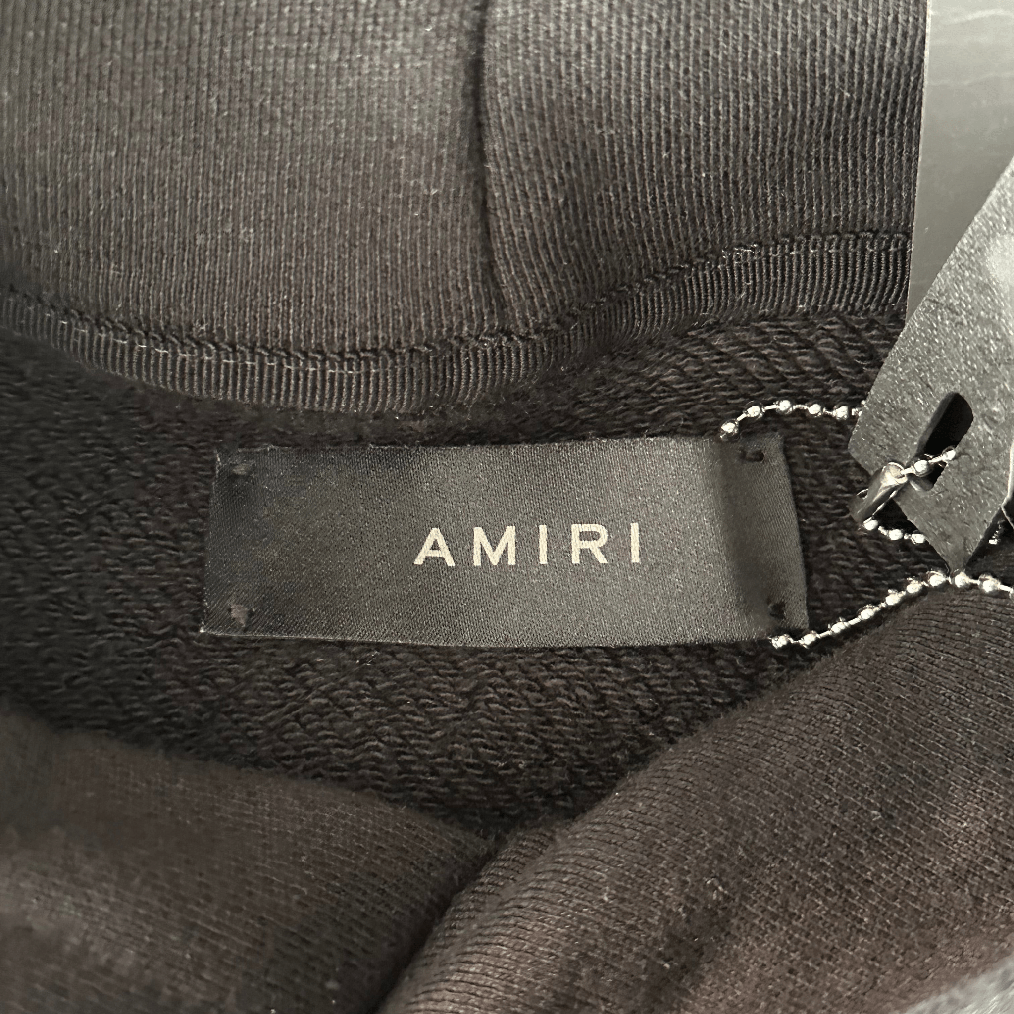 Amiri Black & Blue Staggered Logo Hoodie - Morely TrendsAmiri Type here:)