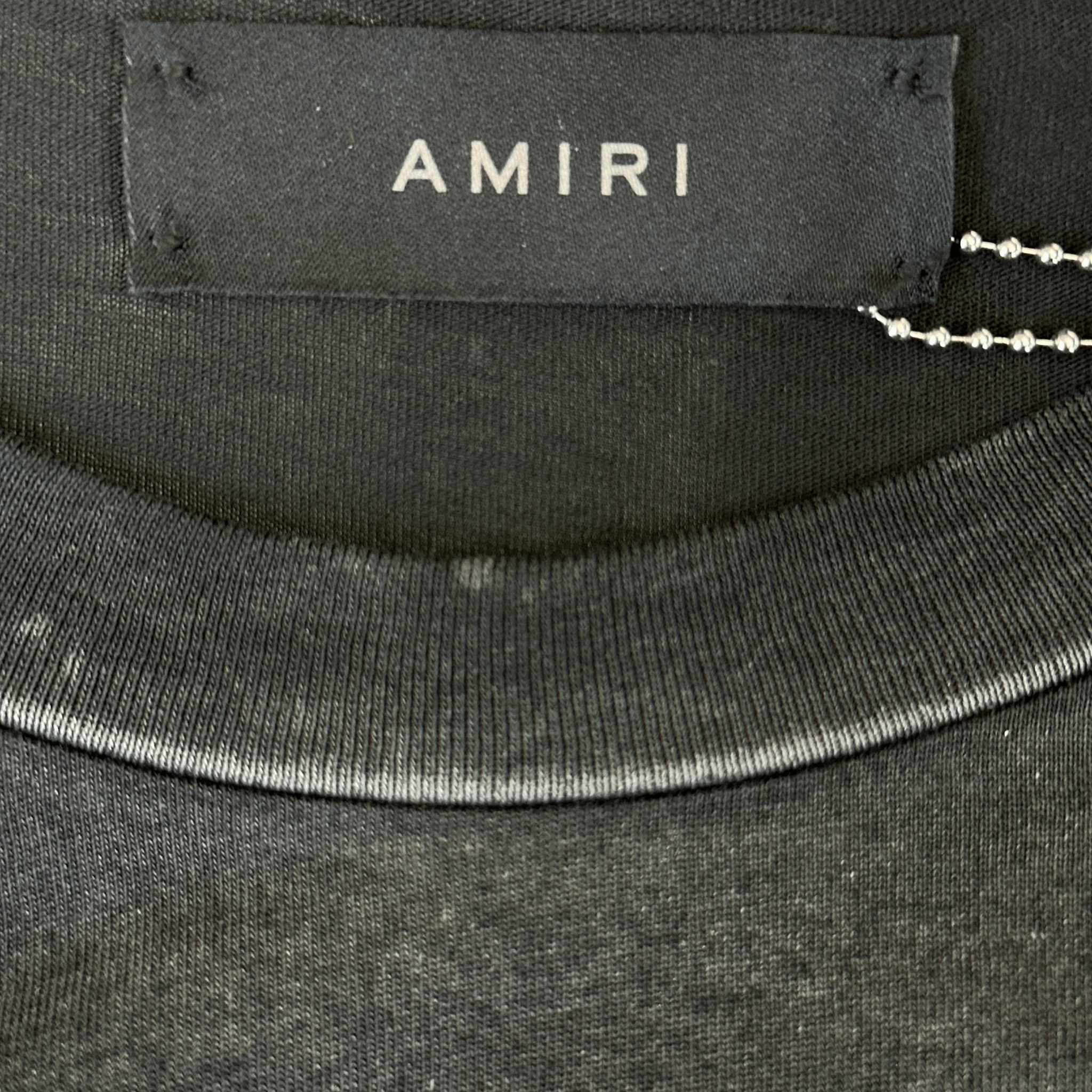 Amiri Black & White Tiger Logo T-Shirt - Morely TrendsAmiri Type here:)