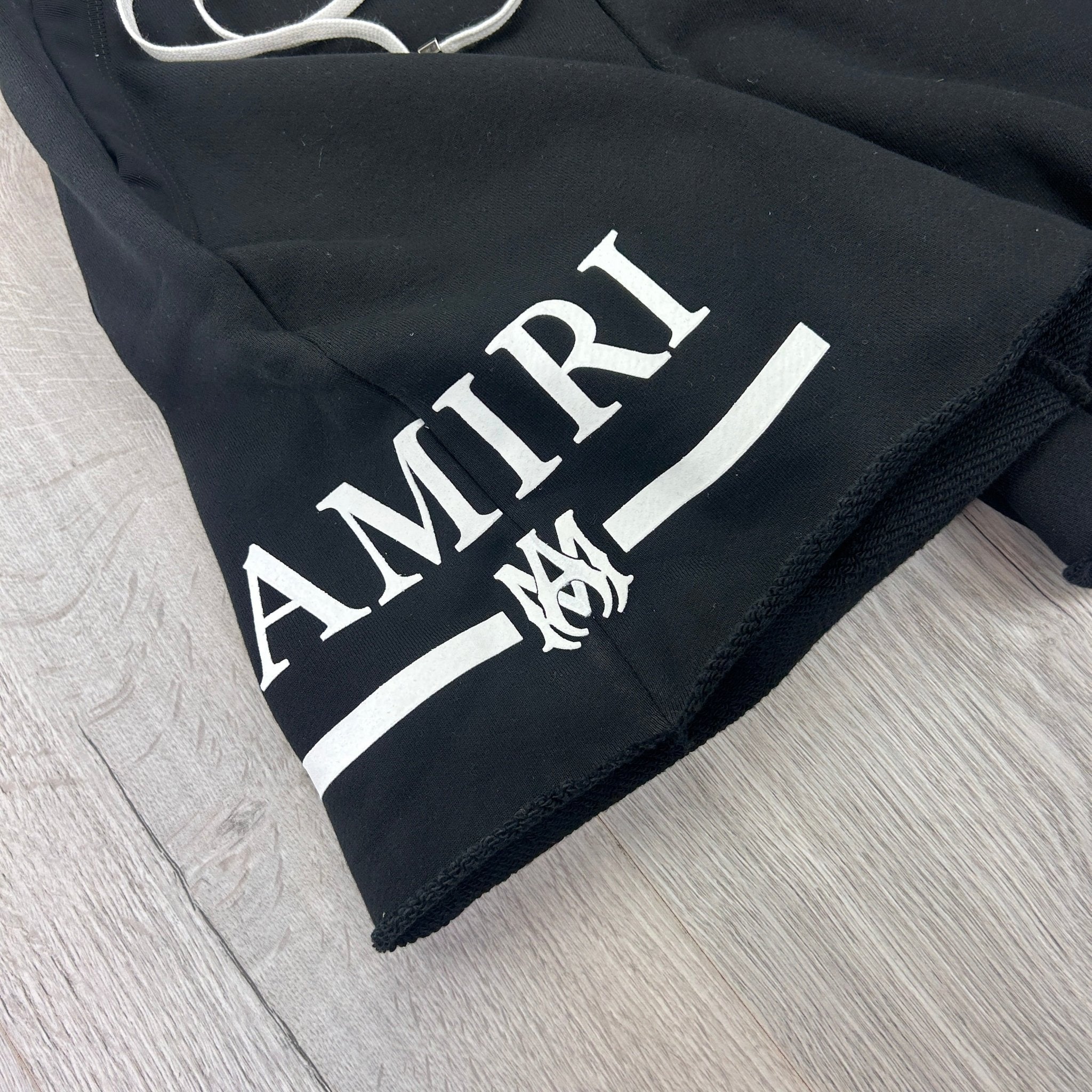 Amiri Men’s Black Cotten Logo Printed Drawstring Shorts - Morely TrendsAmiri Type here:)