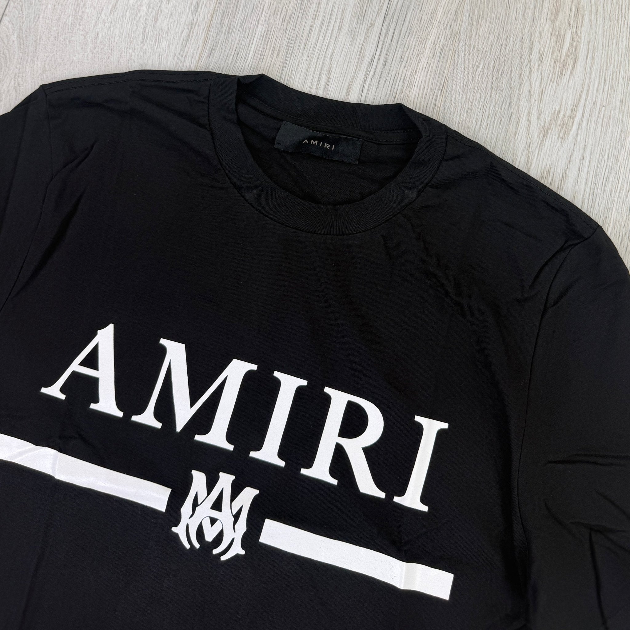 Amiri Men’s Black T-shirt With White Logo - Morely TrendsAmiri Type here:)