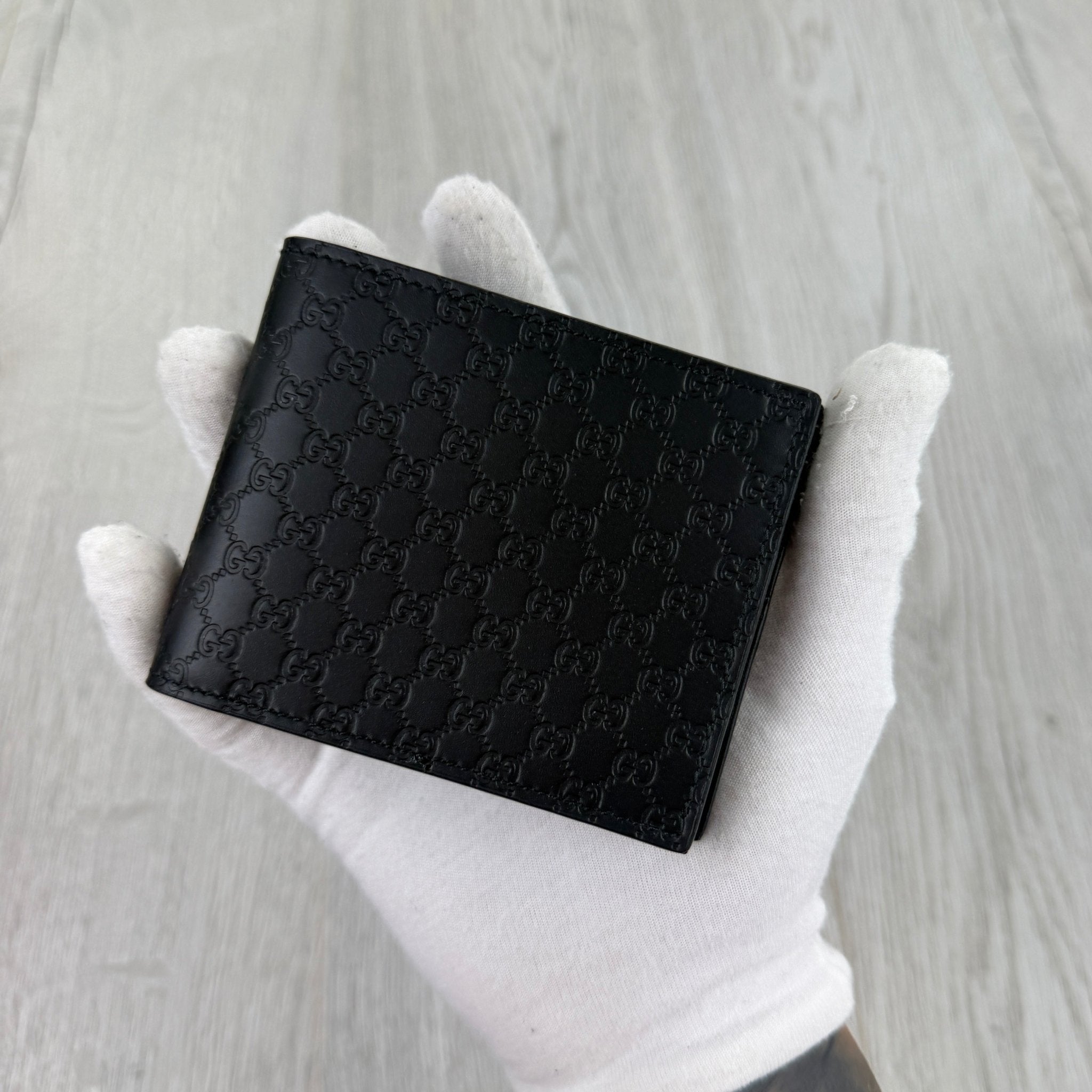 Gucci Men’s GG Leather Monogram Wallet - Morely TrendsGucci Type here:)