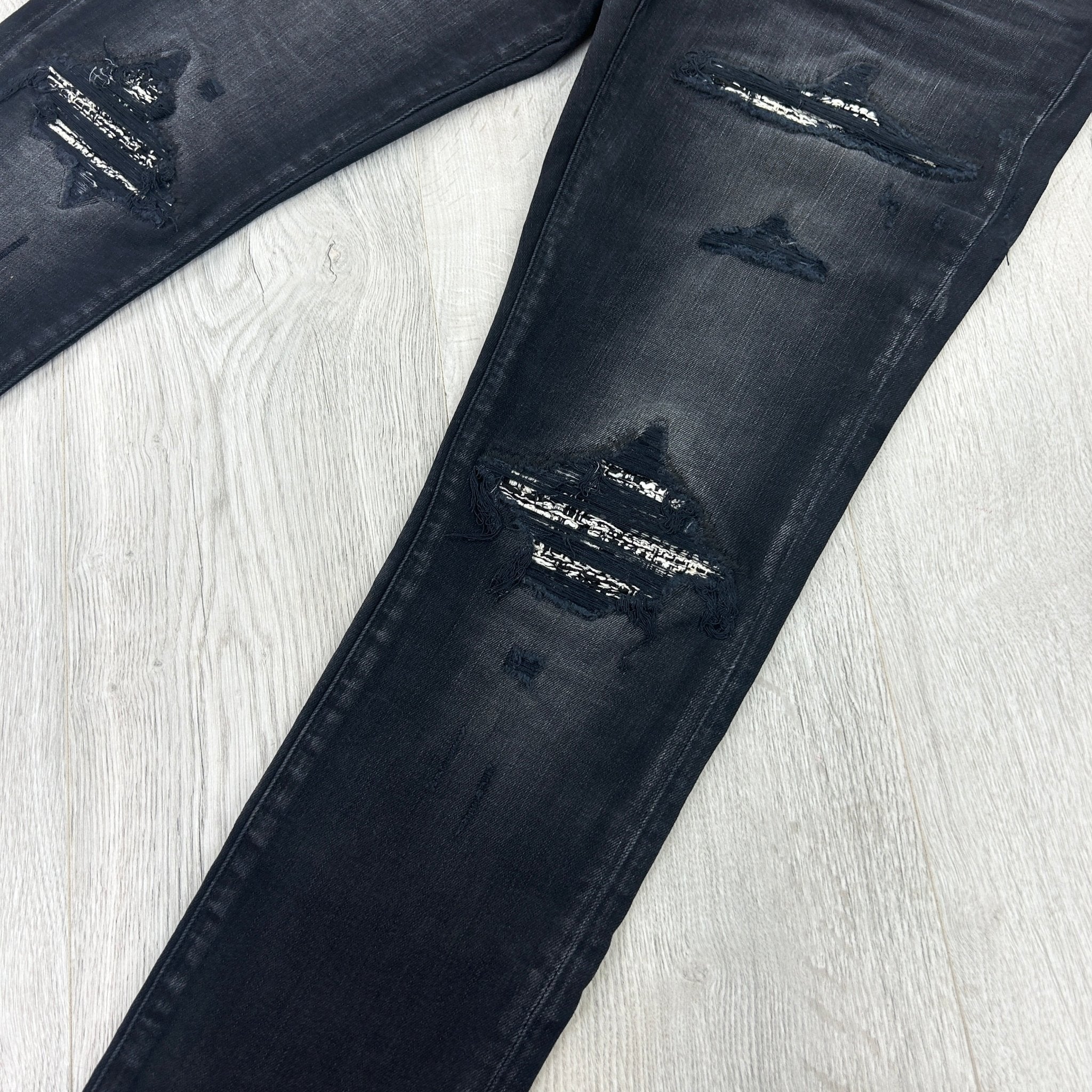 Amiri Men’s Boucle MX1 Aged Black Distressed Jeans - Morely TrendsAmiri Type here:)