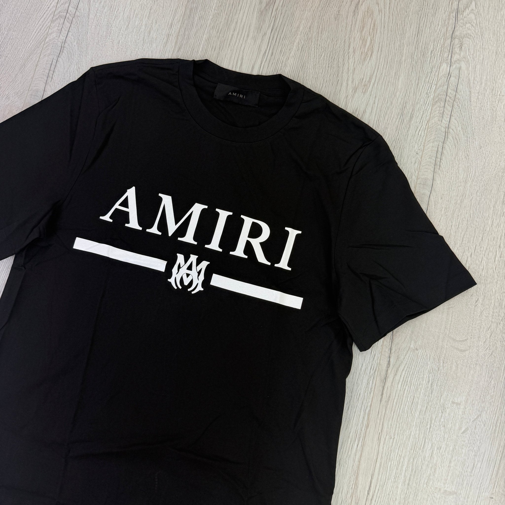 Amiri Men’s Black T-shirt With White Logo - Morely TrendsAmiri Type here:)