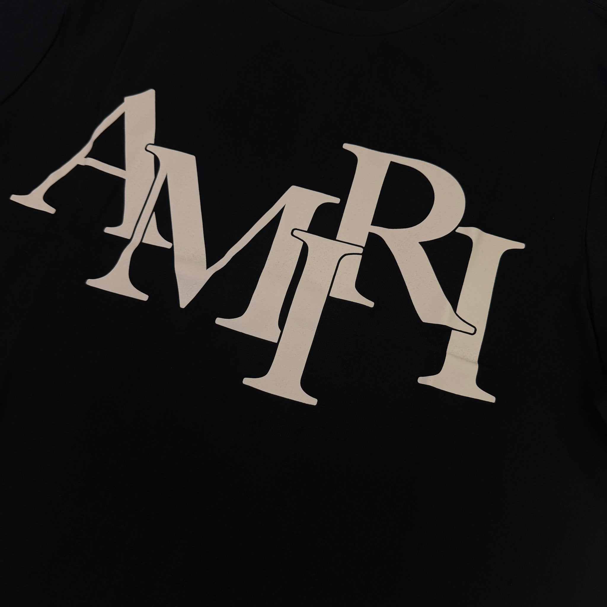 Amiri Men’s Black T-shirt With White Logo - Morely TrendsAmiri Type here:)