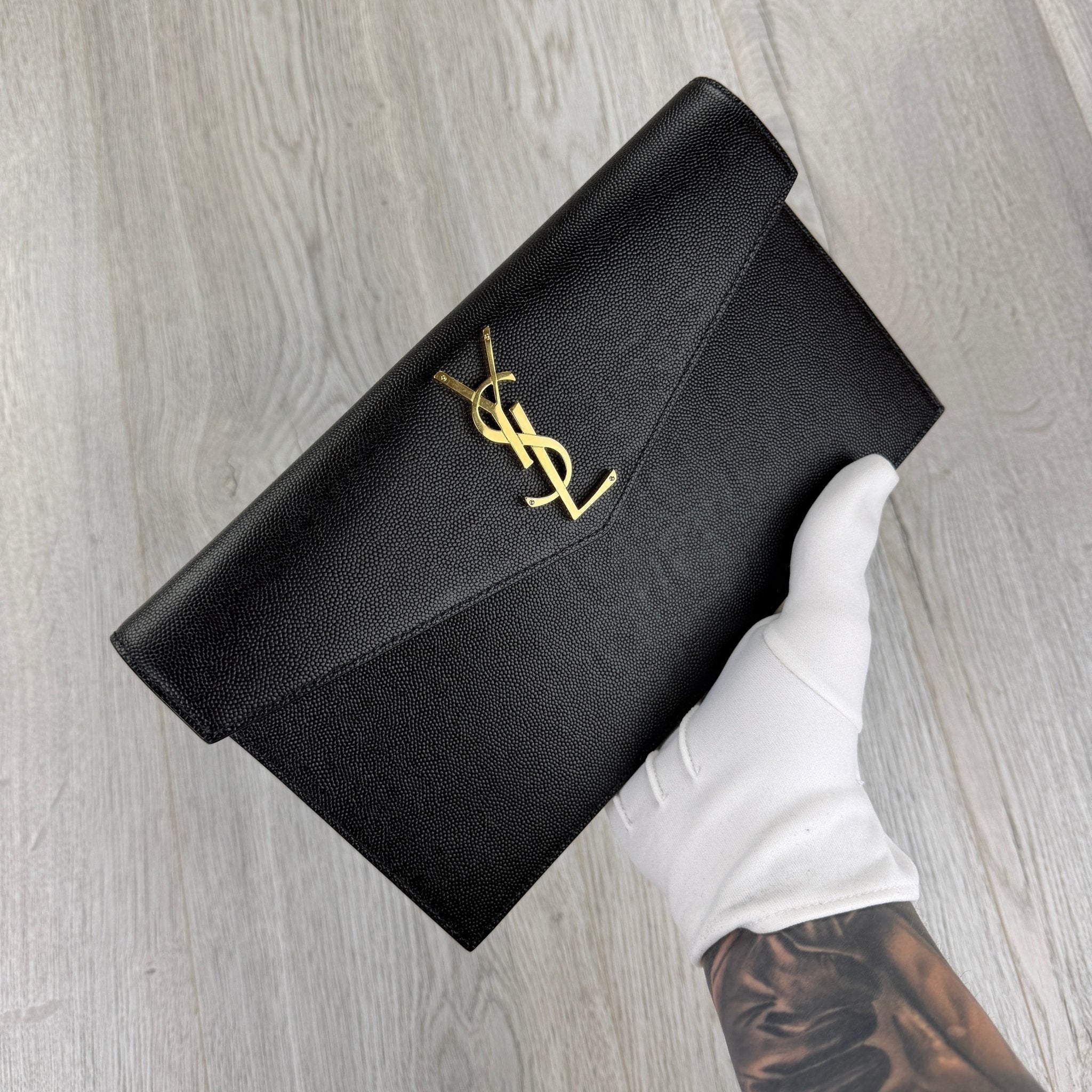 Saint Laurent Women’s Black Clutch Bag - Morely TrendsSaint Laurent Type here:)