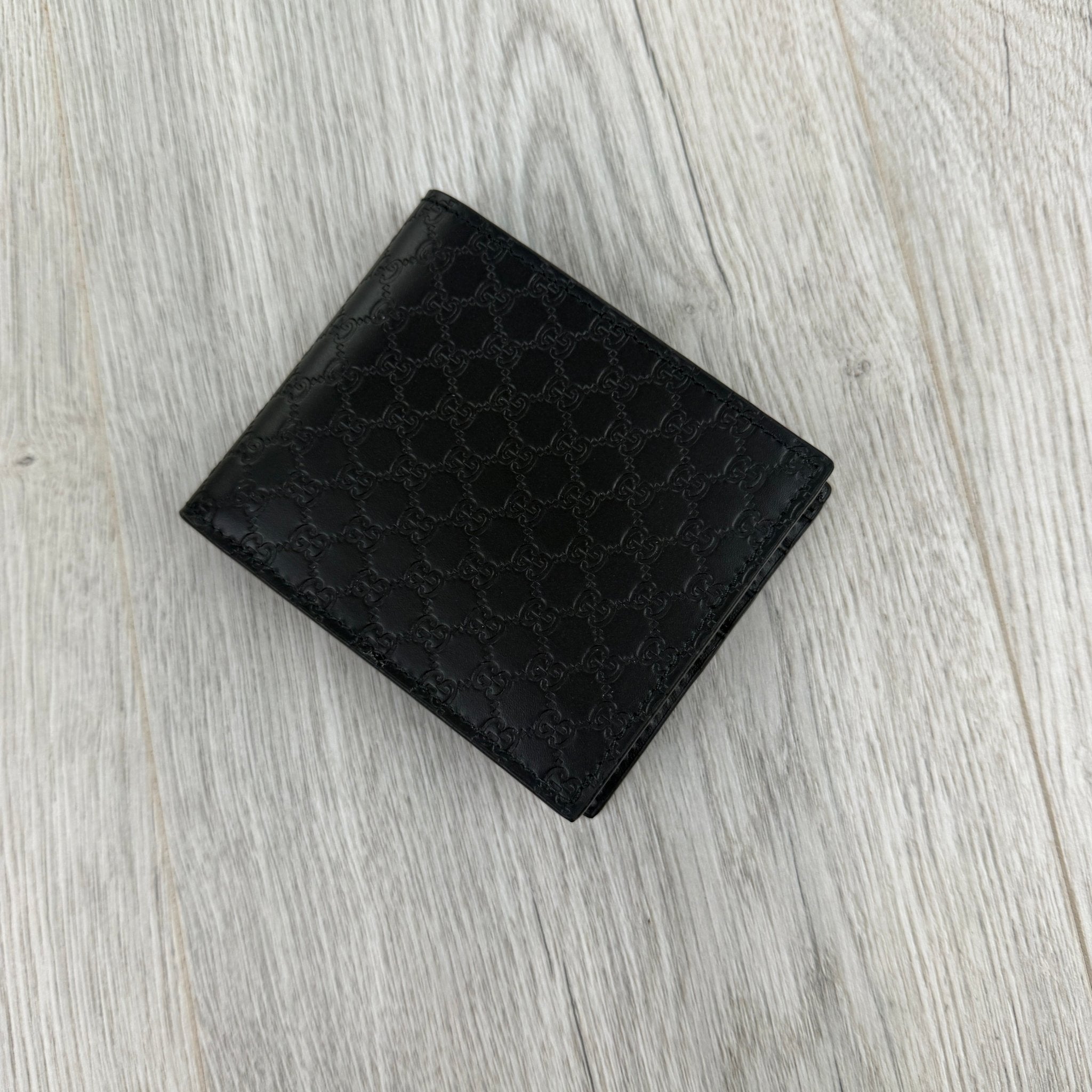 Gucci Men’s GG Leather Monogram Wallet - Morely TrendsGucci Type here:)