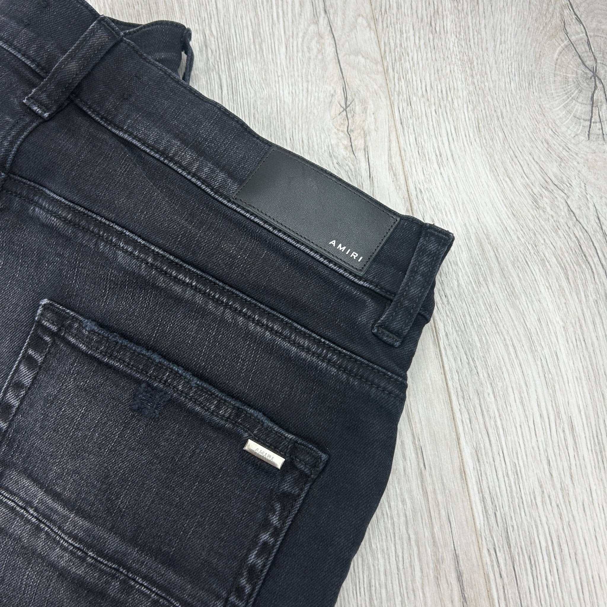Amiri Men’s Boucle MX1 Aged Black Distressed Jeans - Morely TrendsAmiri Type here:)