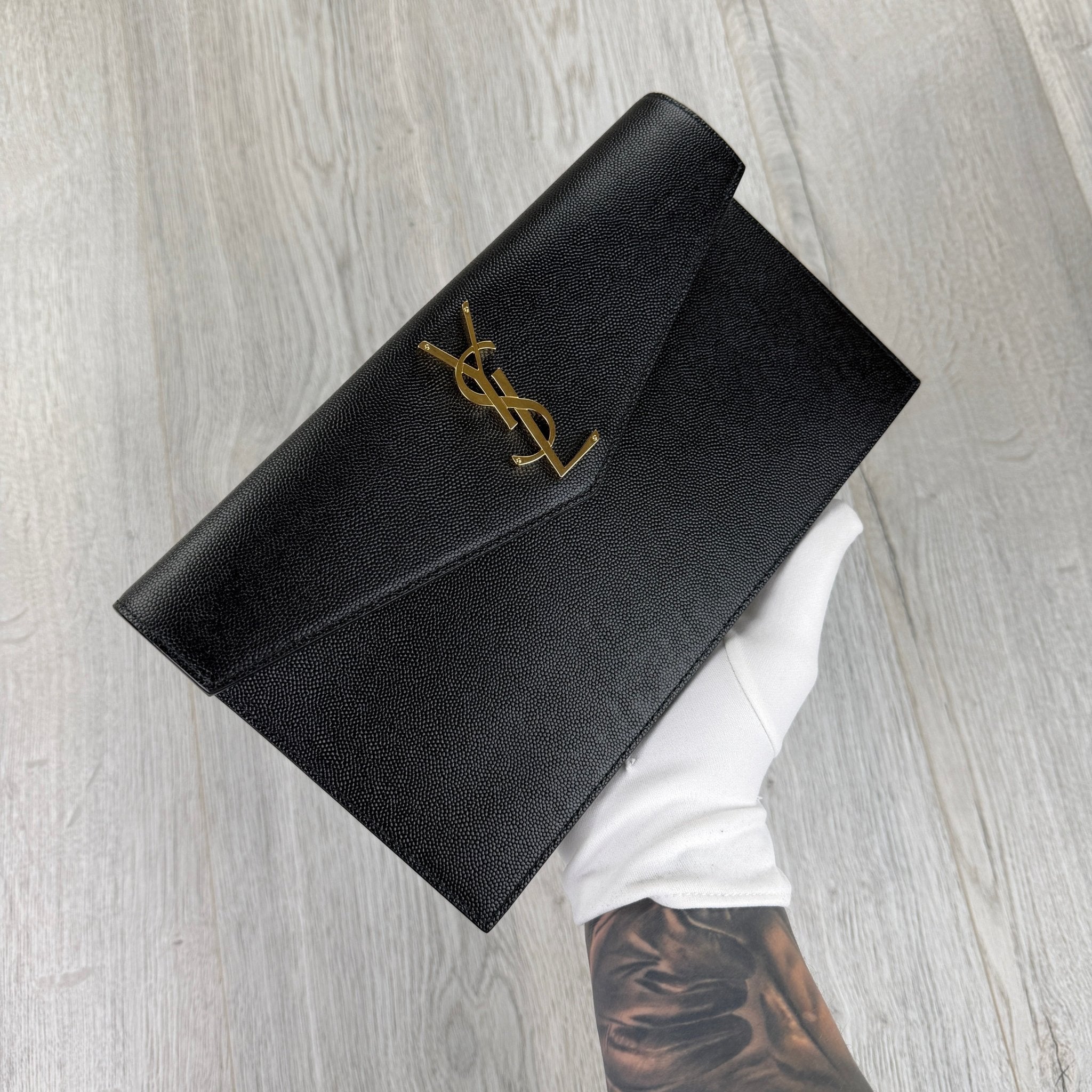 Saint Laurent Women’s Black Clutch Bag - Morely TrendsSaint Laurent Type here:)