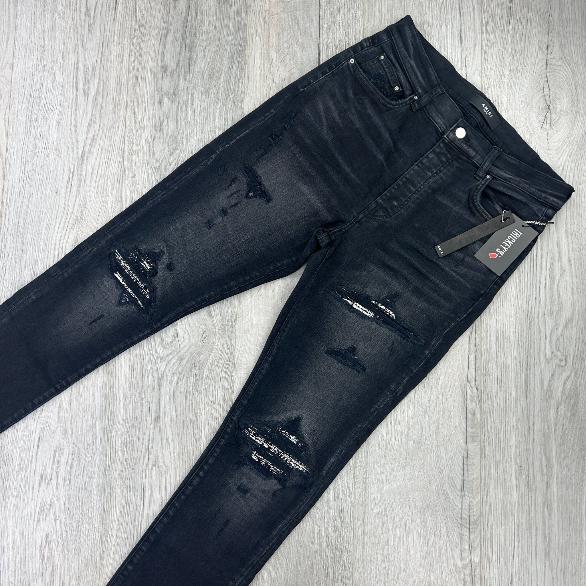 Amiri Men’s Boucle MX1 Aged Black Distressed Jeans - Morely TrendsAmiri Type here:)