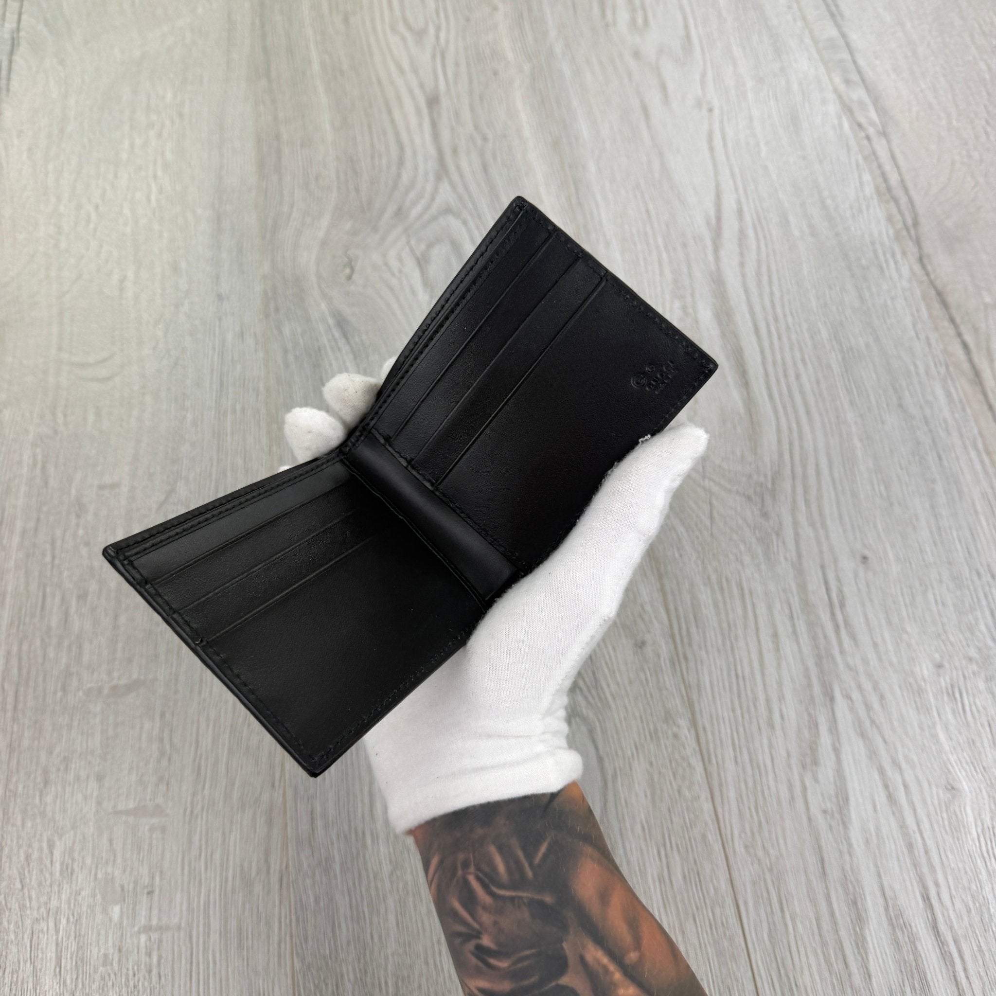 Gucci Men’s GG Leather Monogram Wallet - Morely TrendsGucci Type here:)