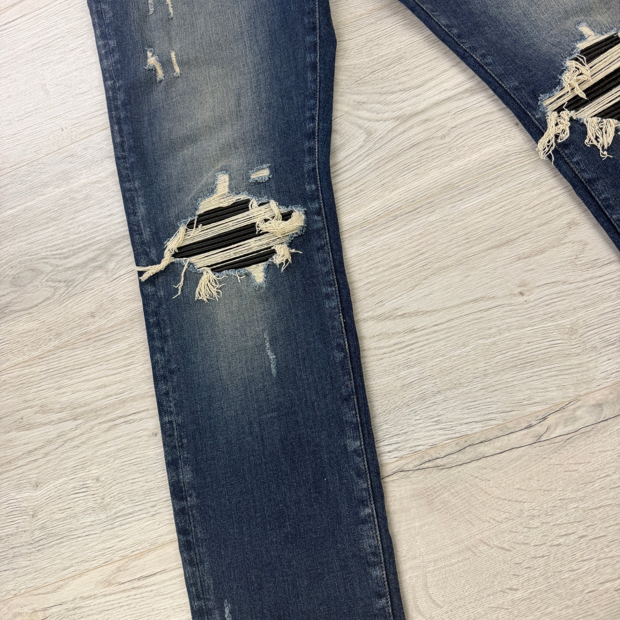 Amiri Men’s Blue MX1 Distressed Ripped Jeans - Morely TrendsAmiri Type here:)