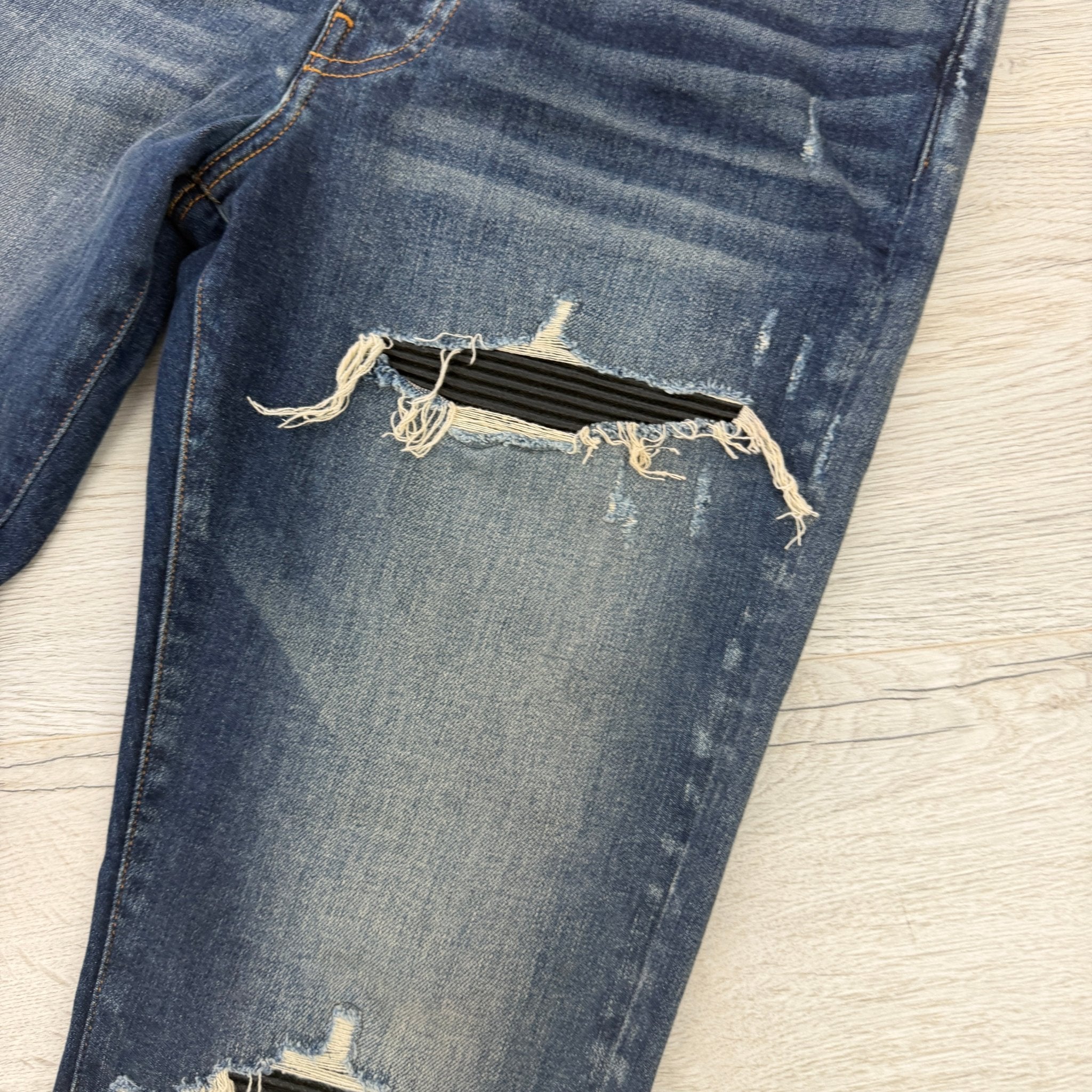 Amiri Men’s Blue MX1 Distressed Ripped Jeans - Morely TrendsAmiri Type here:)