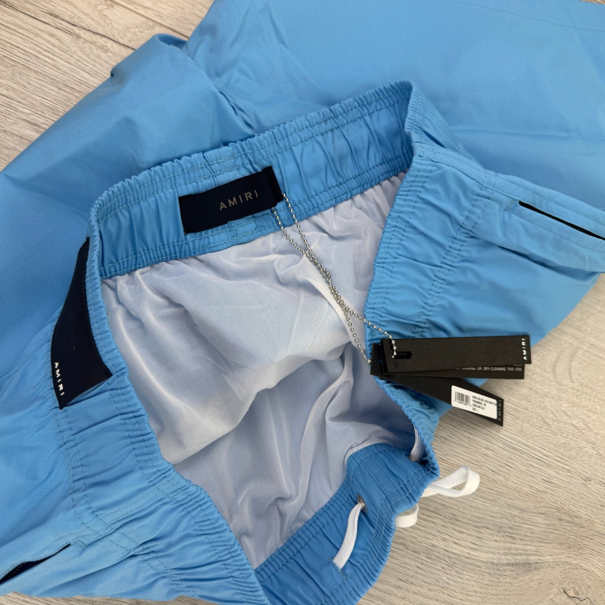 Amiri Men’s Baby Blue Swim Shorts - Morely TrendsAmiri Type here:)
