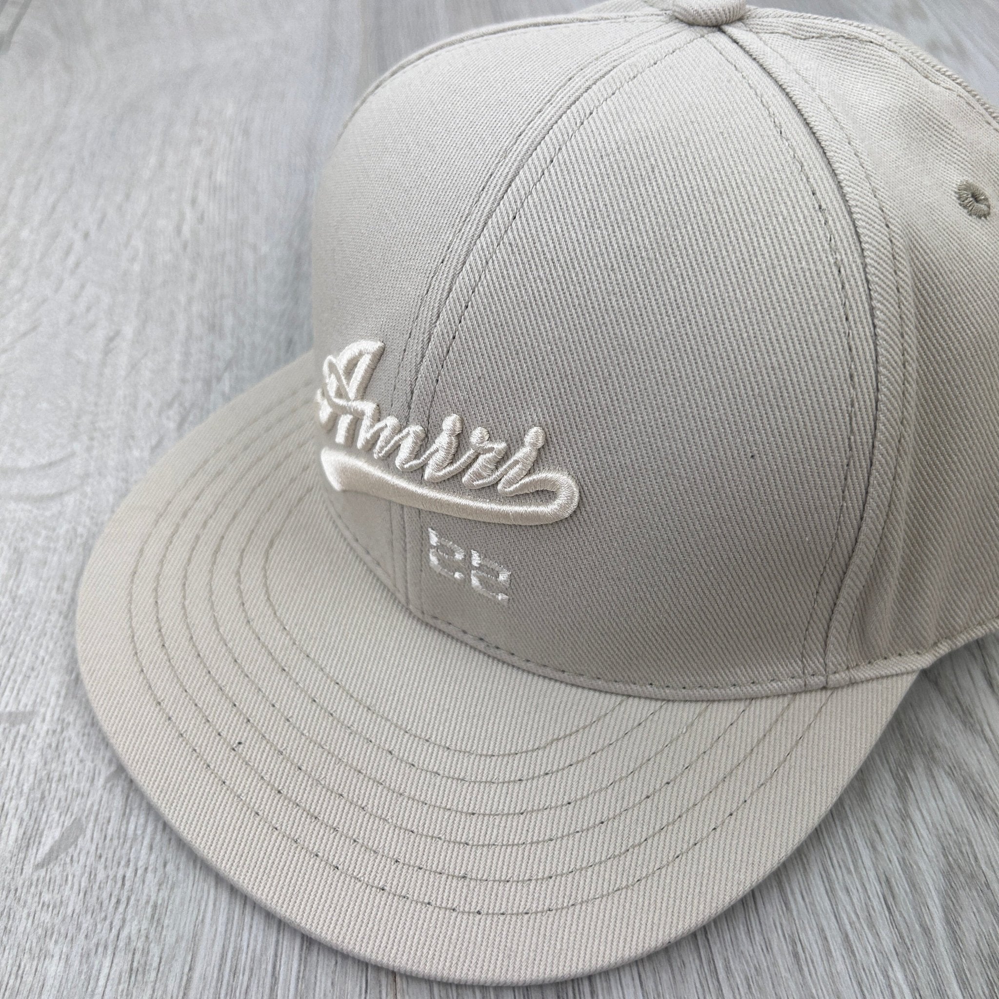 Amiri Men’s 22 Fitted Flat Beige Cap - Morely TrendsAmiri Type here:)