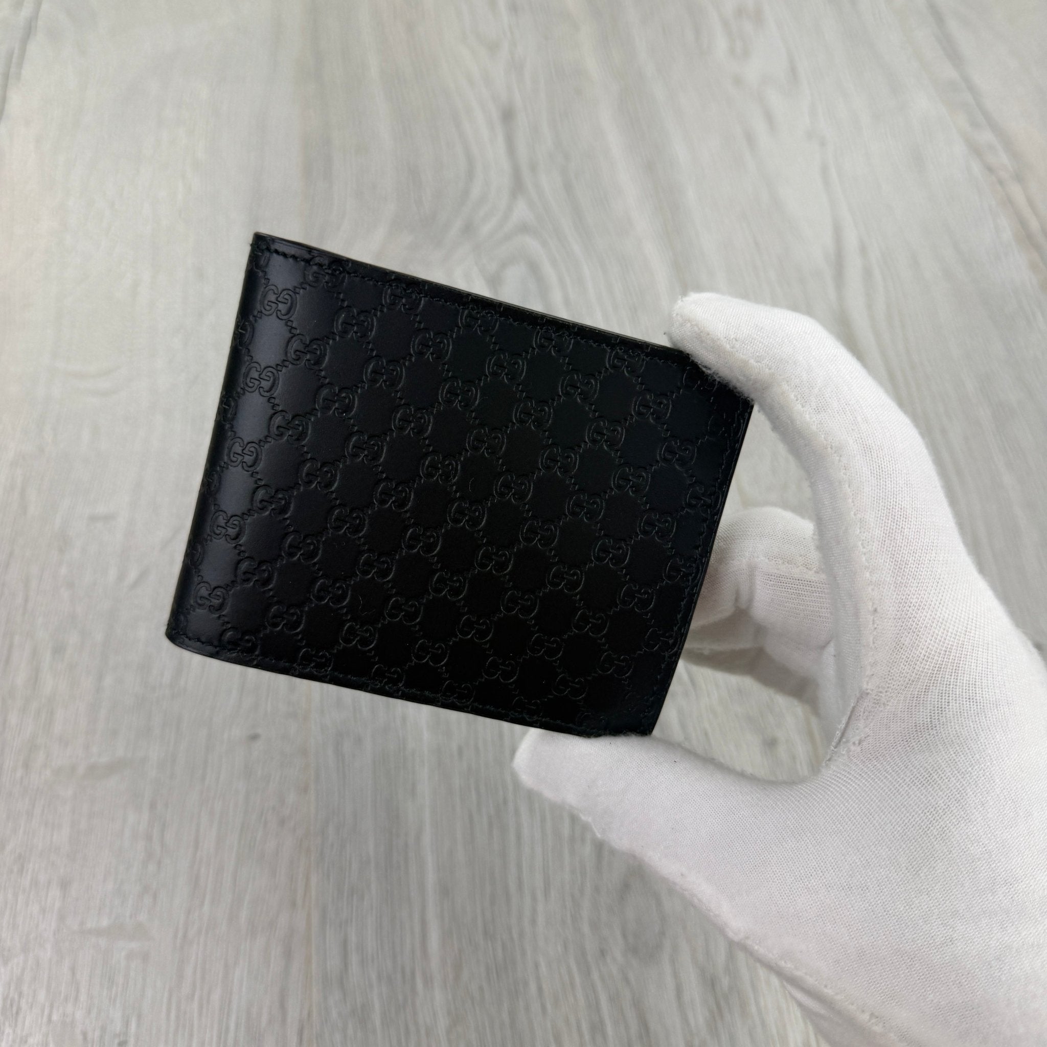Gucci Men’s GG Leather Monogram Wallet - Morely TrendsGucci Type here:)