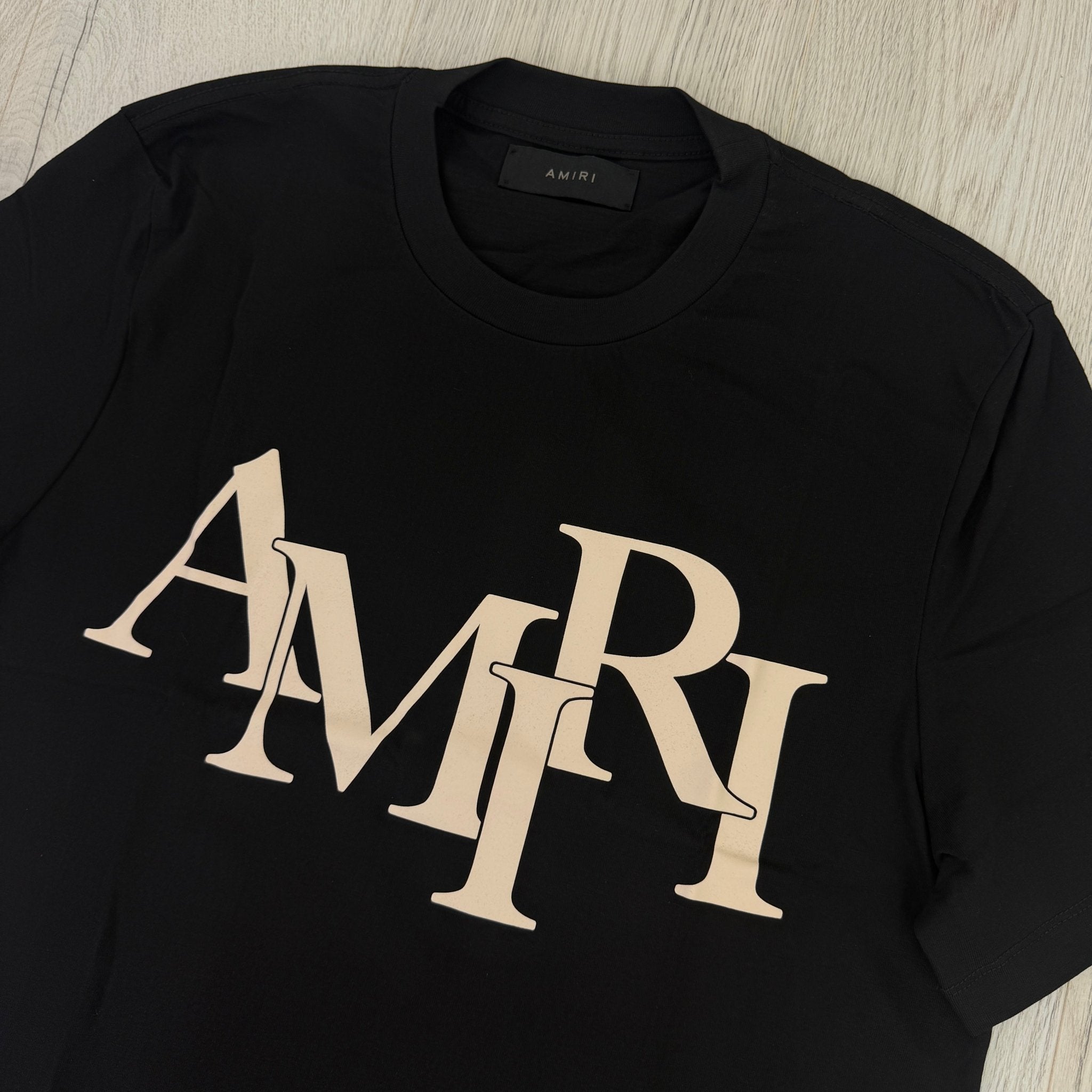 Amiri Men’s Black T-shirt With White Logo - Morely TrendsAmiri Type here:)