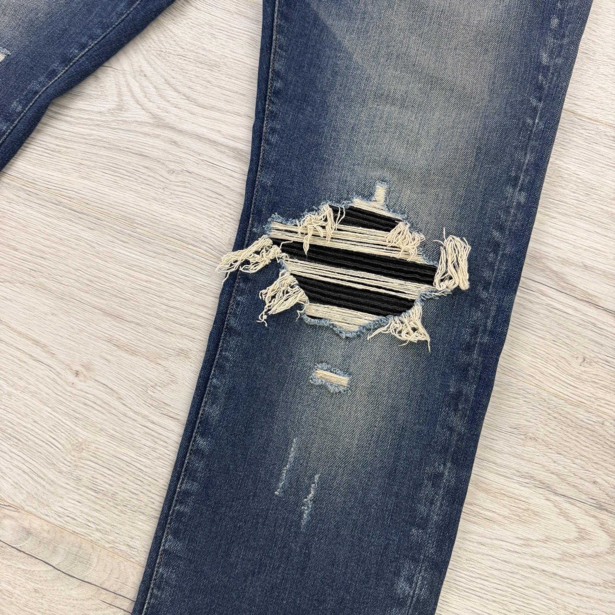 Amiri Men’s Blue MX1 Distressed Ripped Jeans - Morely TrendsAmiri Type here:)