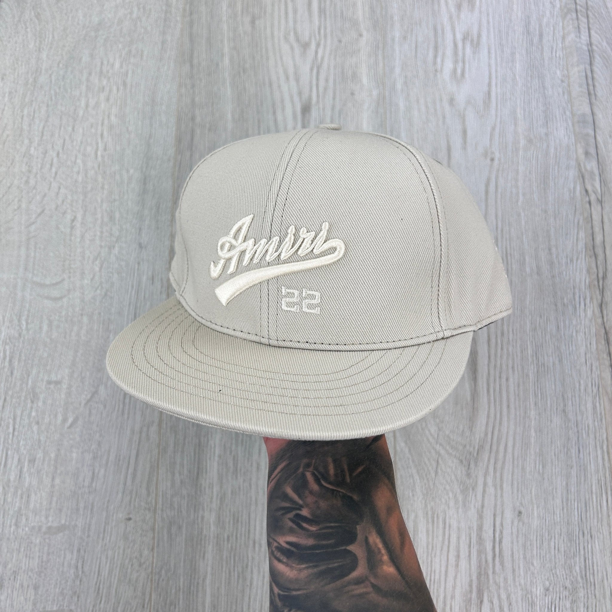 Amiri Men’s 22 Fitted Flat Beige Cap - Morely TrendsAmiri Type here:)