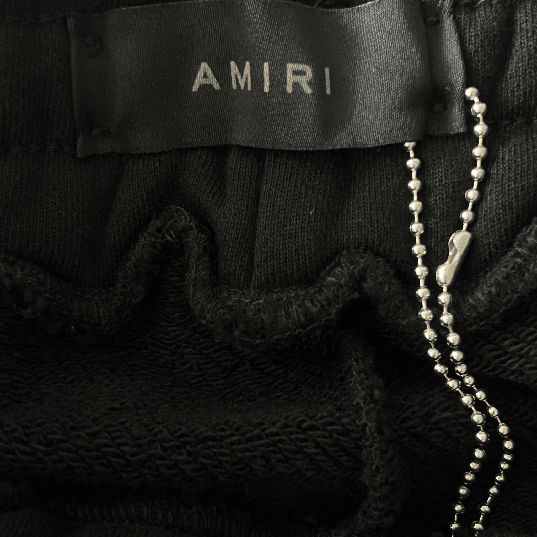 Amiri Black & White Checkered Bones Sweatpants - Morely TrendsAmiri Type here:)