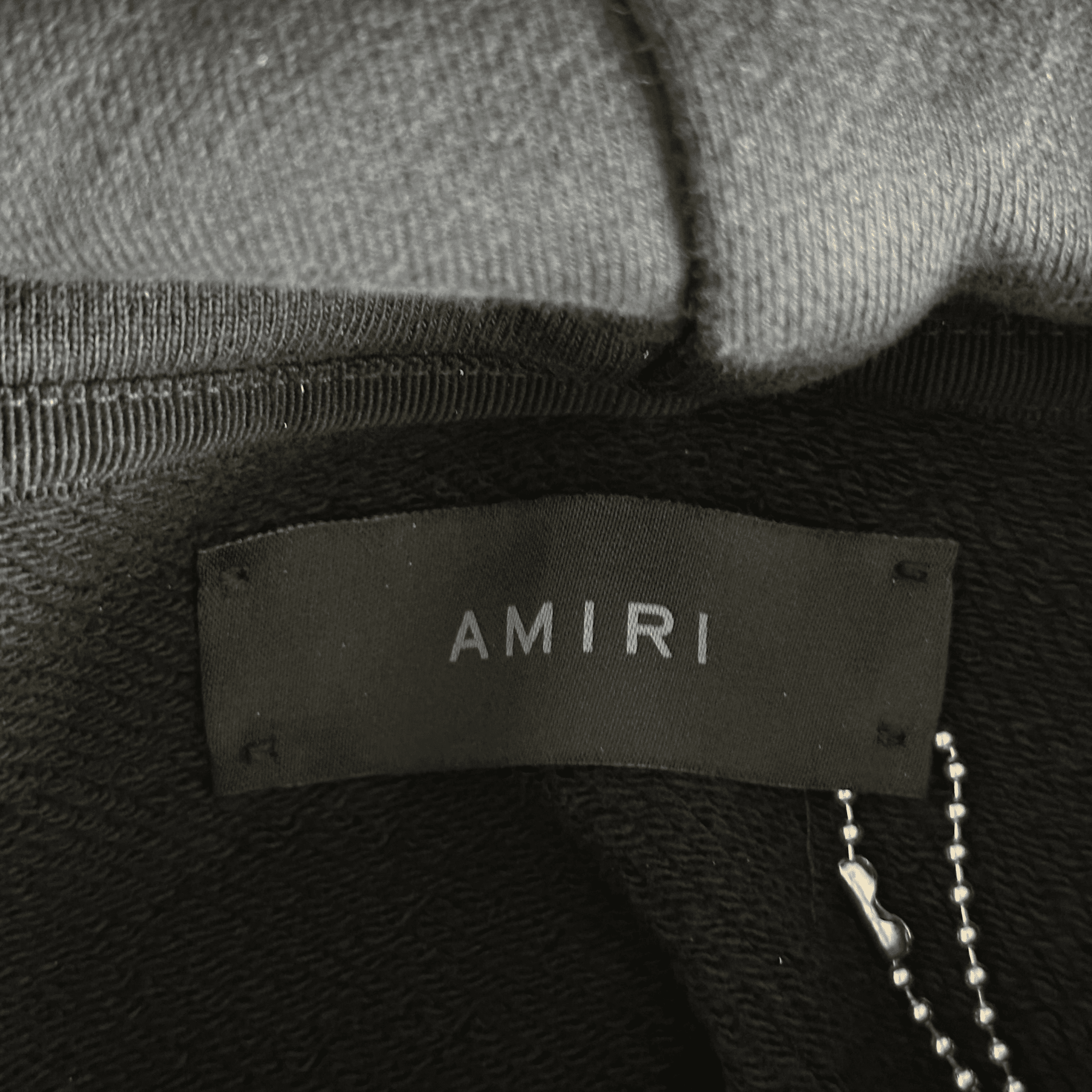 Amiri Black & White Cracked Core Logo Hoodie - Morely TrendsAmiri Type here:)