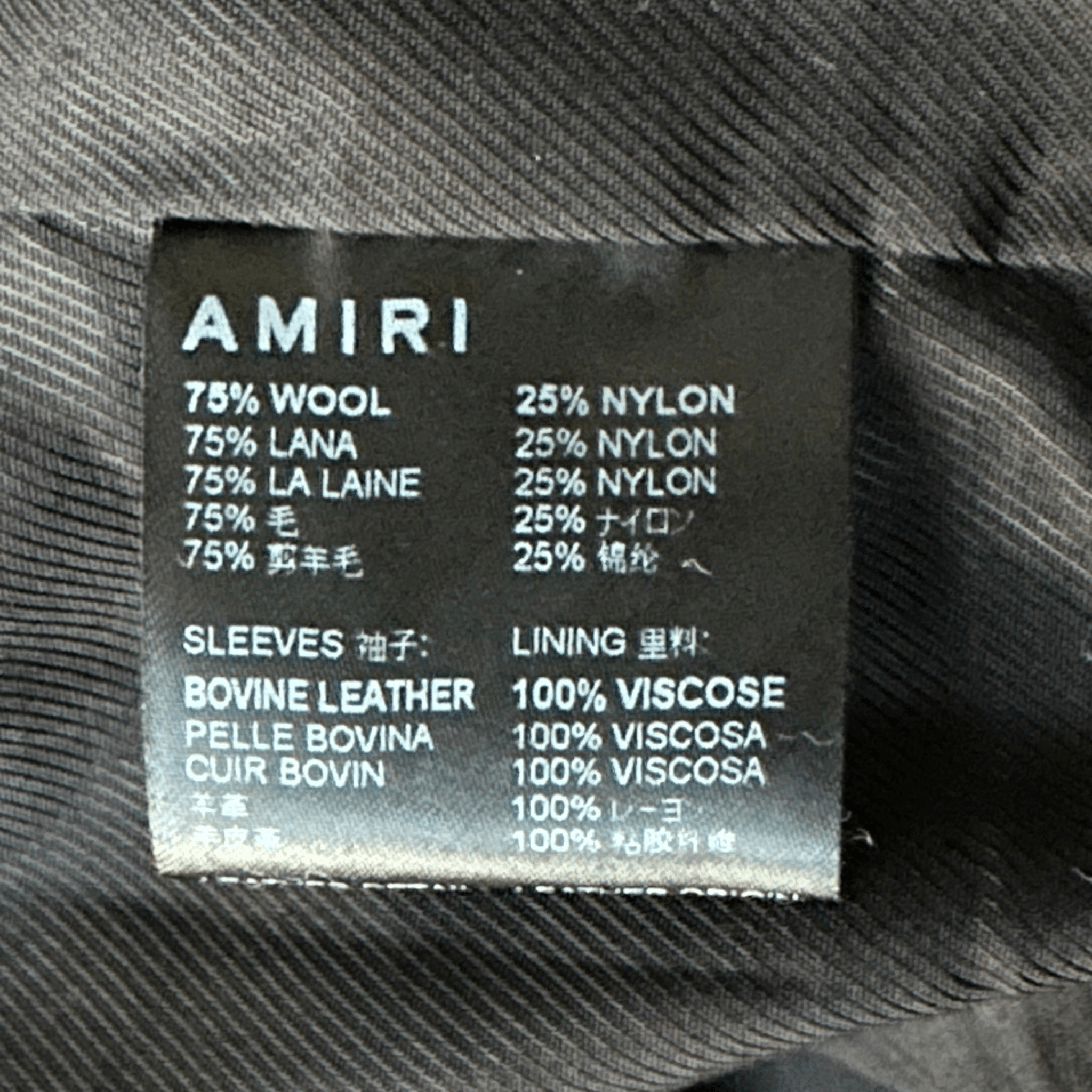 Amiri Black & White Imagination Varsity Jacket - Morely TrendsAmiri Type here:)