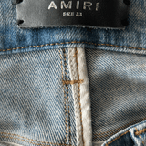 Amiri Blue Denim Core Applique Logo Distressed Jeans - Morely TrendsAmiri Type here:)
