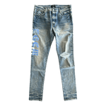 Amiri Clay Indigo & Blue T.G.C.W Distressed Logo Jeans - Morely TrendsAmiri Type here:)