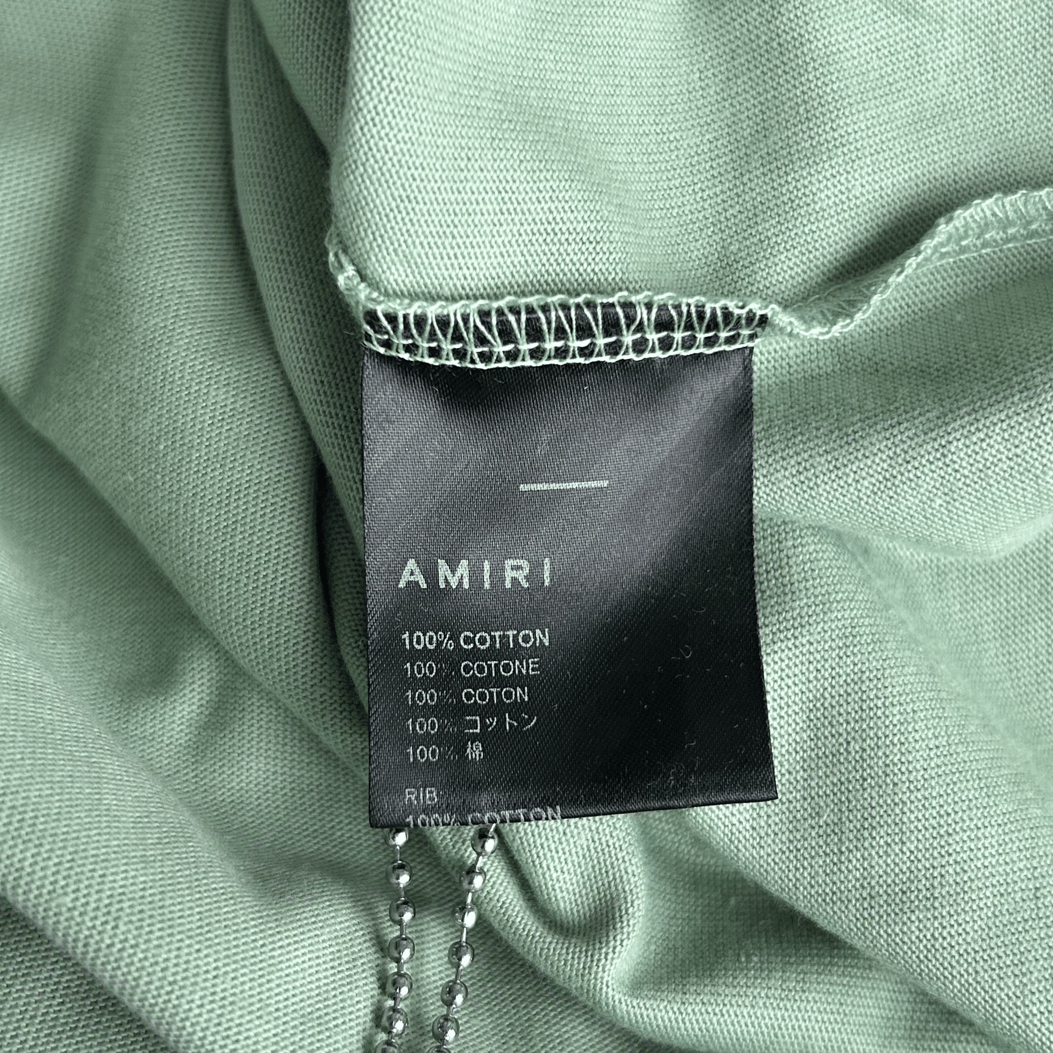 Amiri Green & White Staggered Logo T-Shirt - Morely TrendsAmiri Type here:)