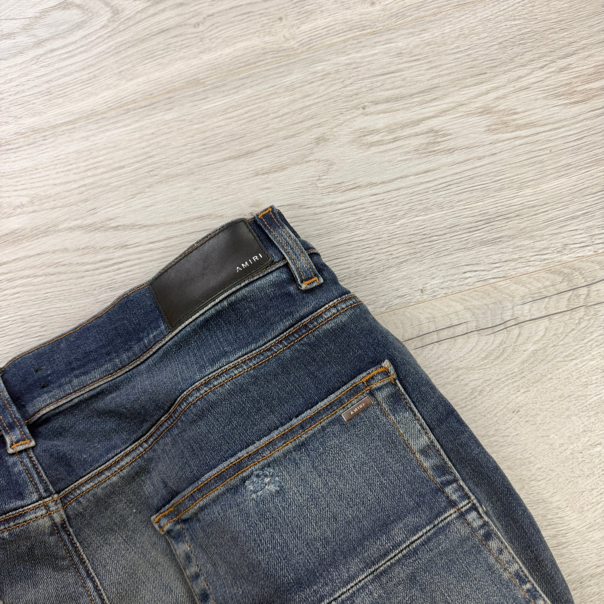 Amiri Men’s Blue MX1 Distressed Ripped Jeans - Morely TrendsAmiri Type here:)