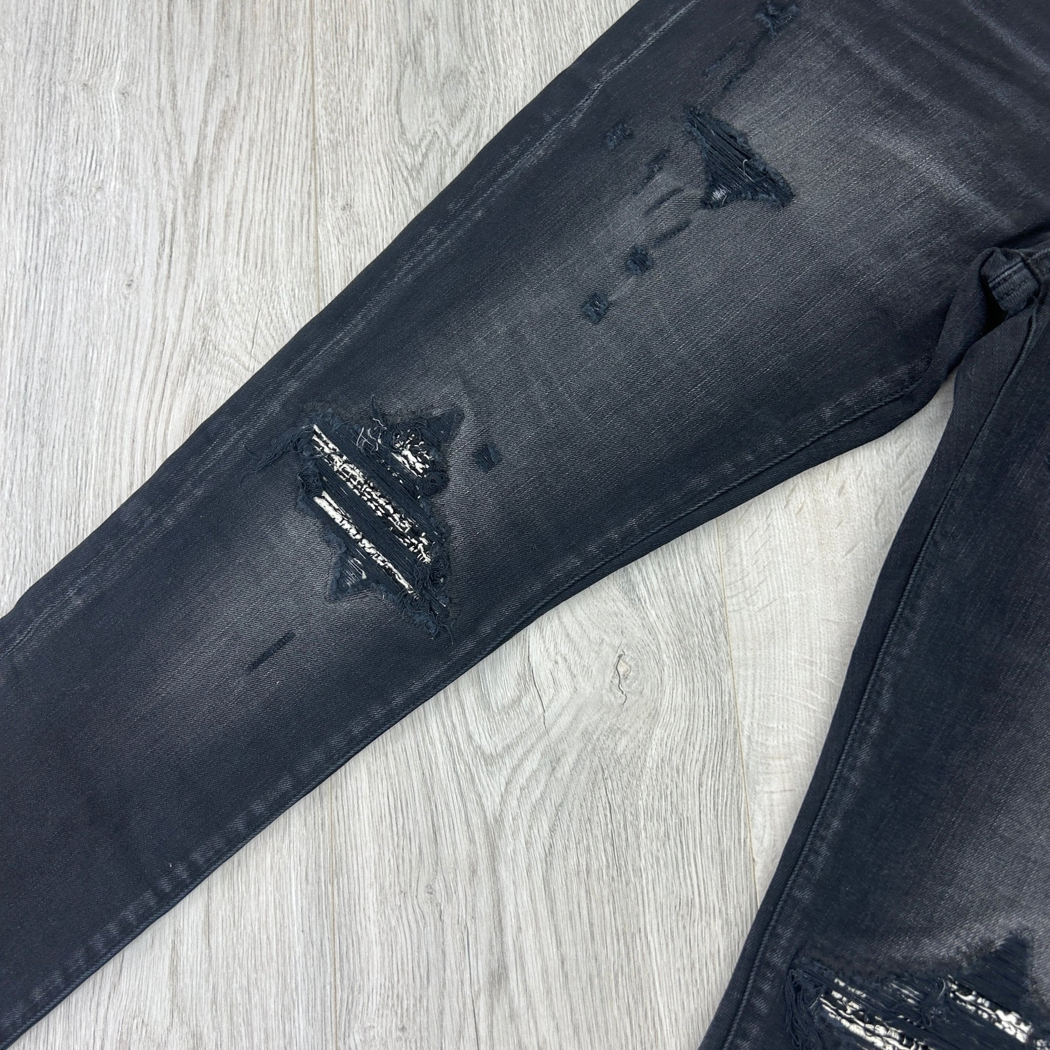 Amiri Men’s Boucle MX1 Aged Black Distressed Jeans - Morely TrendsAmiri Type here:)