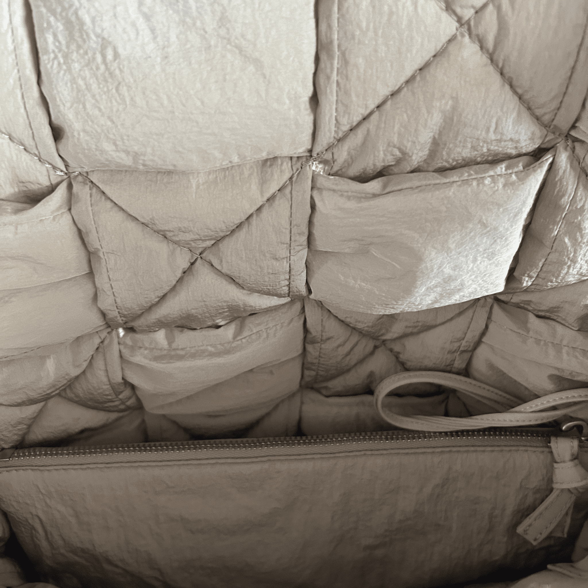 Bottega Veneta Beige Padded Tech Cassette Bag - Morely TrendsBottega Veneta Type here:)