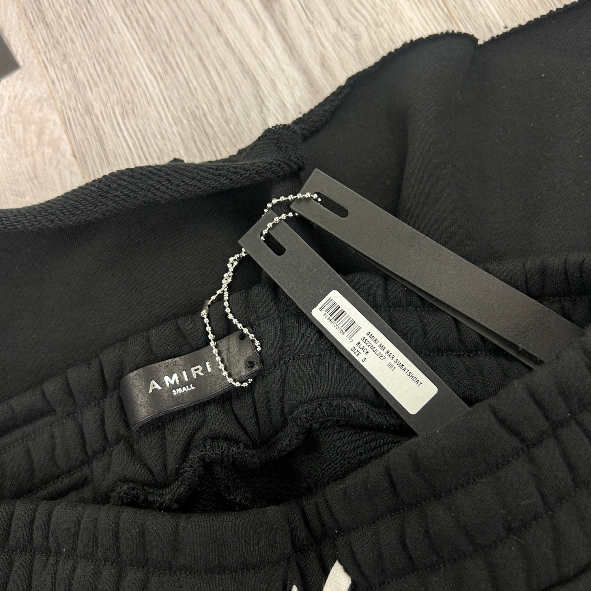 Amiri Men’s Black Cotten Logo Printed Drawstring Shorts - Morely TrendsAmiri Type here:)