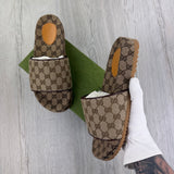 Gucci Men’s Beige GG Canvas Sliders