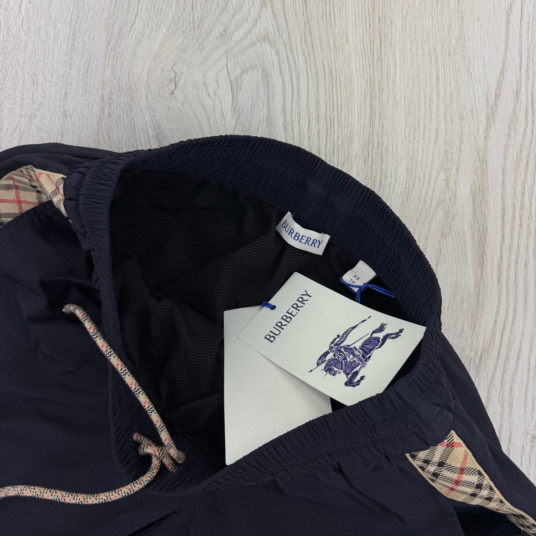 Burberry Men’s Navy Swim Shorts - Morely TrendsBurberry Type here:)