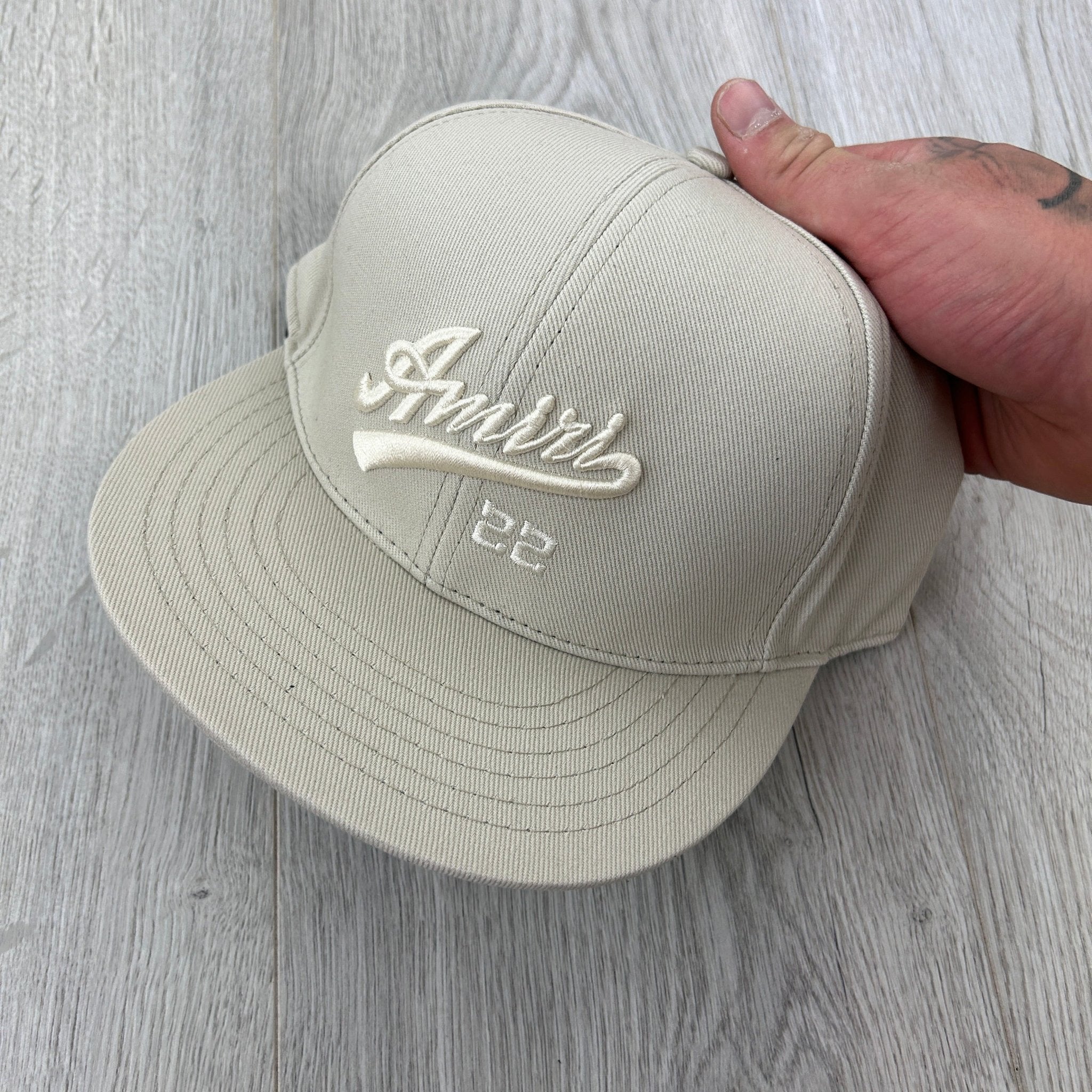 Amiri Men’s 22 Fitted Flat Beige Cap - Morely TrendsAmiri Type here:)
