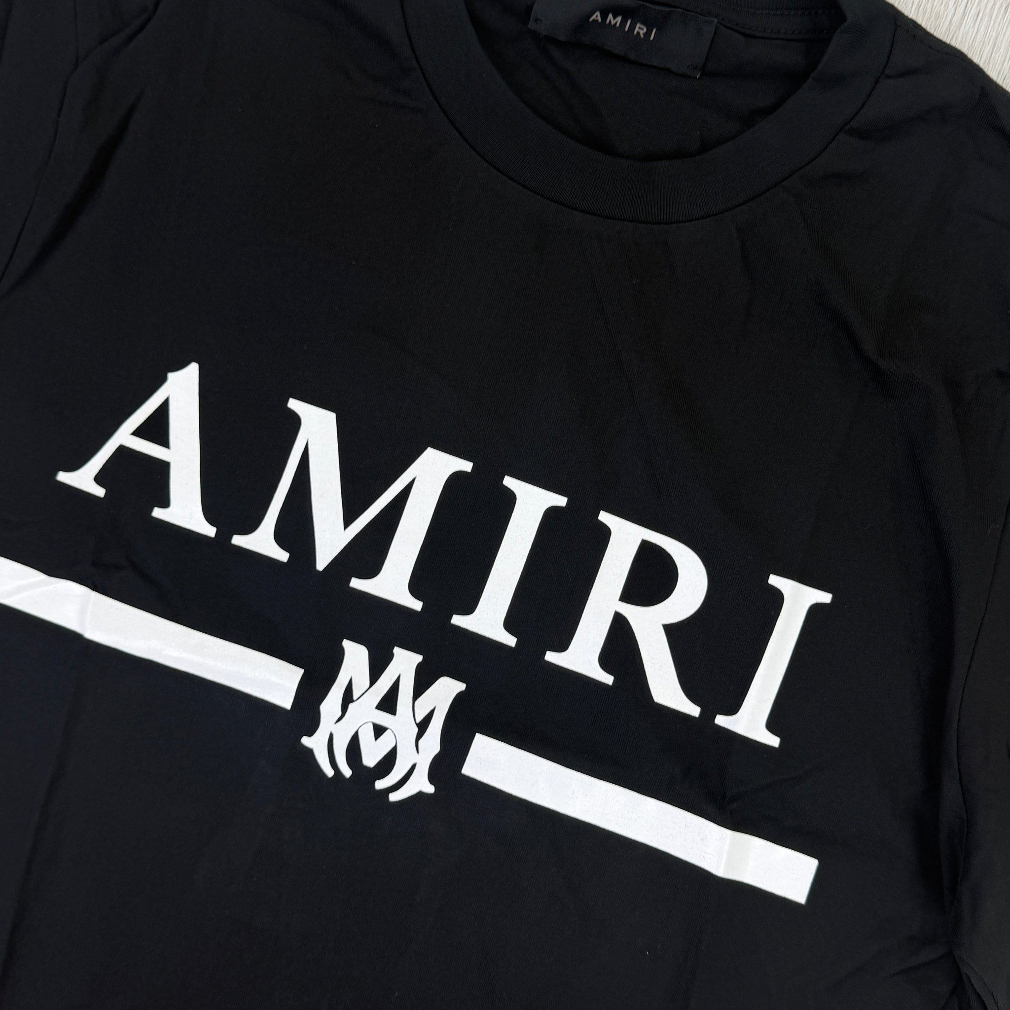 Amiri Men’s Black T-shirt With White Logo - Morely TrendsAmiri Type here:)