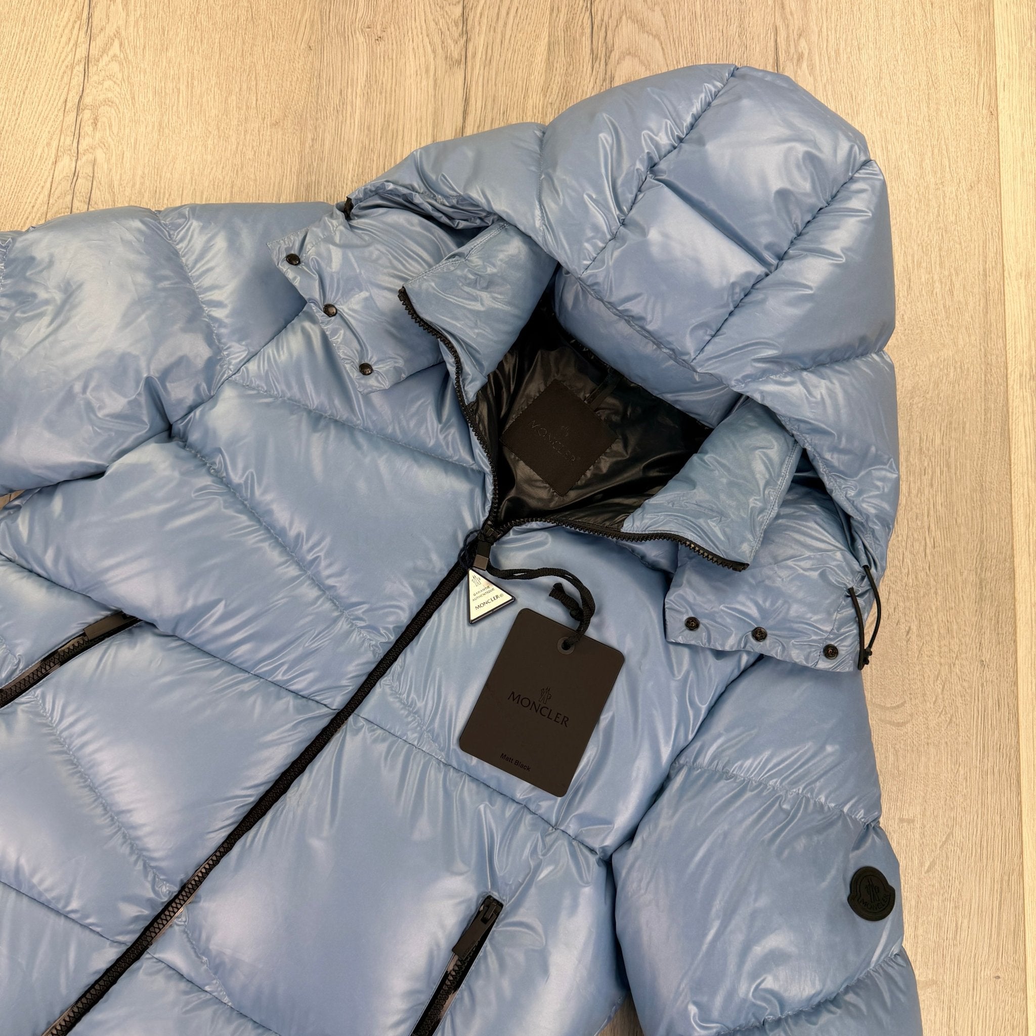 Moncler Men’s Yonne Baby Blue Black Badge Zip-up Down Jacket - Morely TrendsMoncler Type here:)